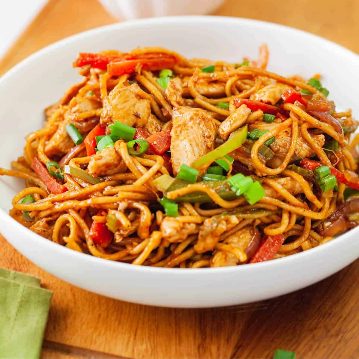 Delicious chicken lo mein with colorful vegetables