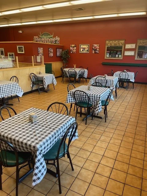 A vibrant restaurant interior with colorful decor and inviting seating.