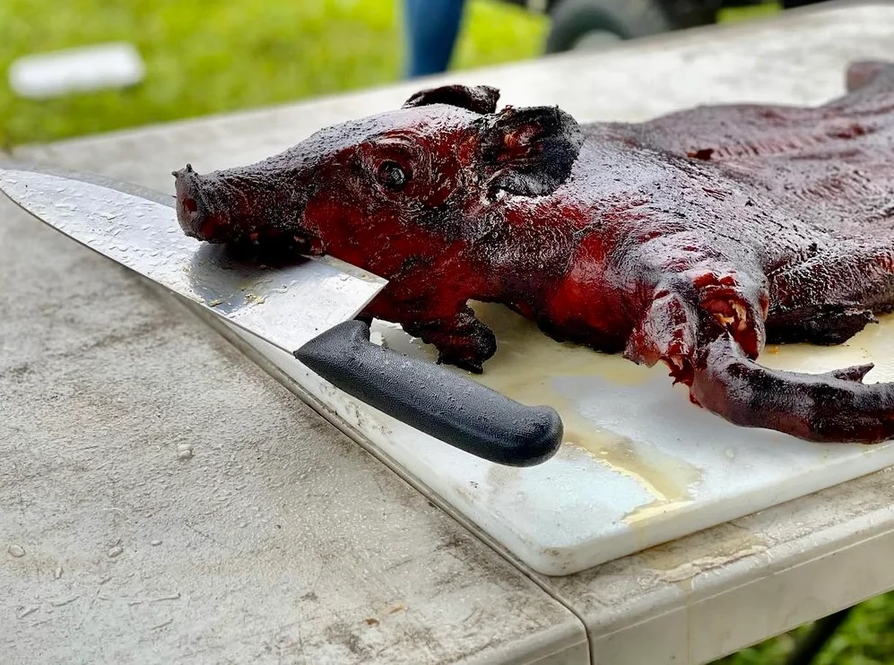 Whole roasted pig for a traditional luau feast