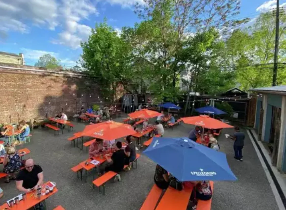 Outdoor dining area with colorful umbrellas and seating