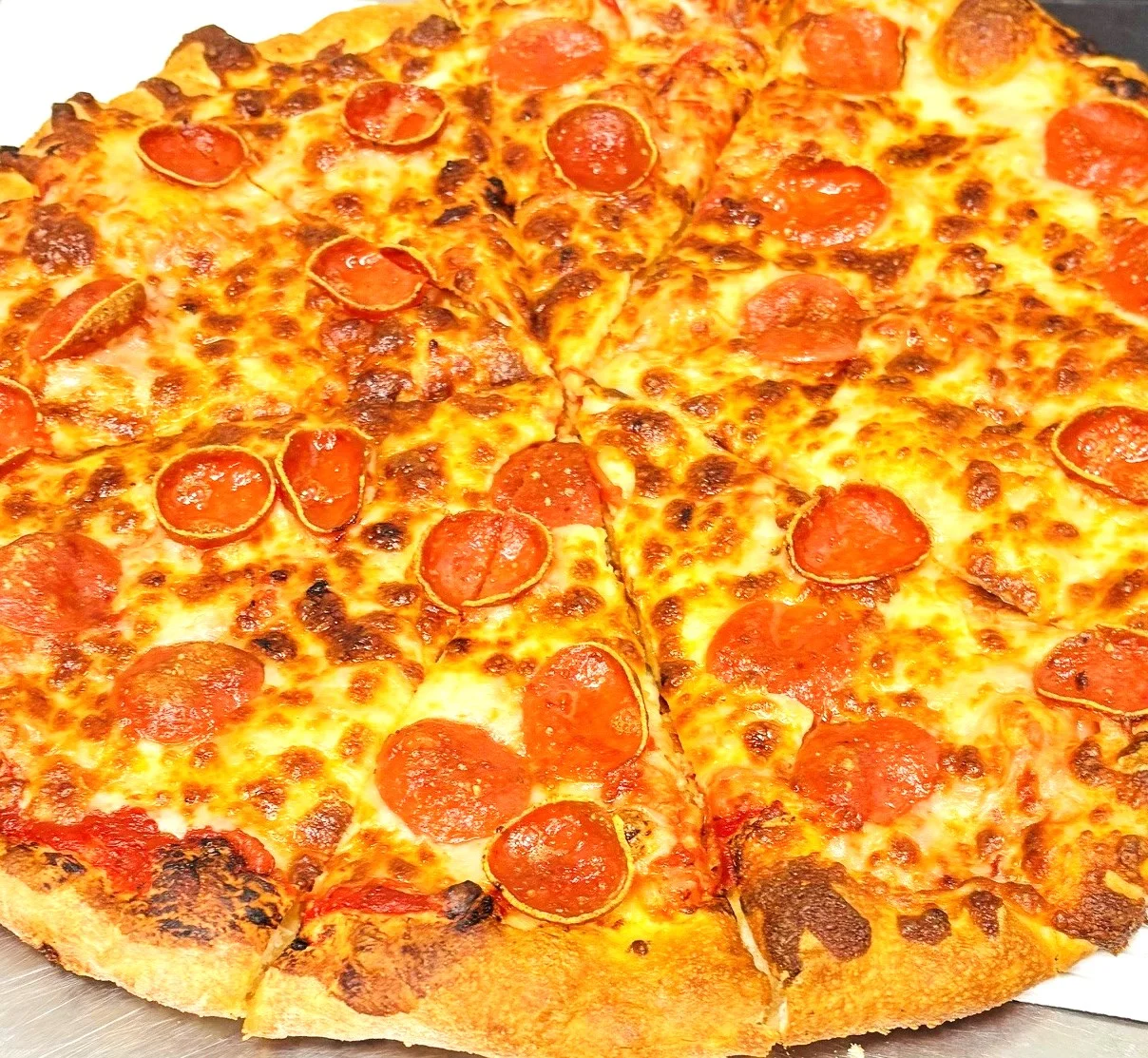 Pepperoni pizza with a crispy crust and melted cheese