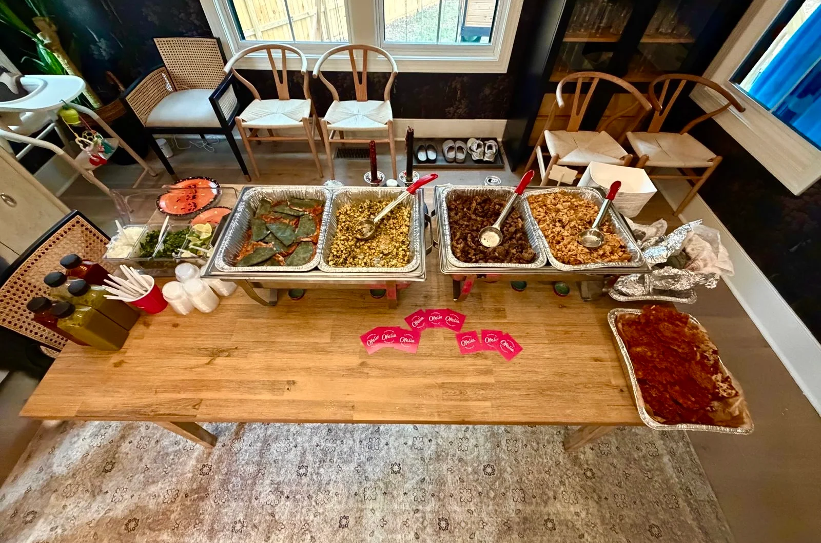 Buffet of Mexican dishes including tamales and rice