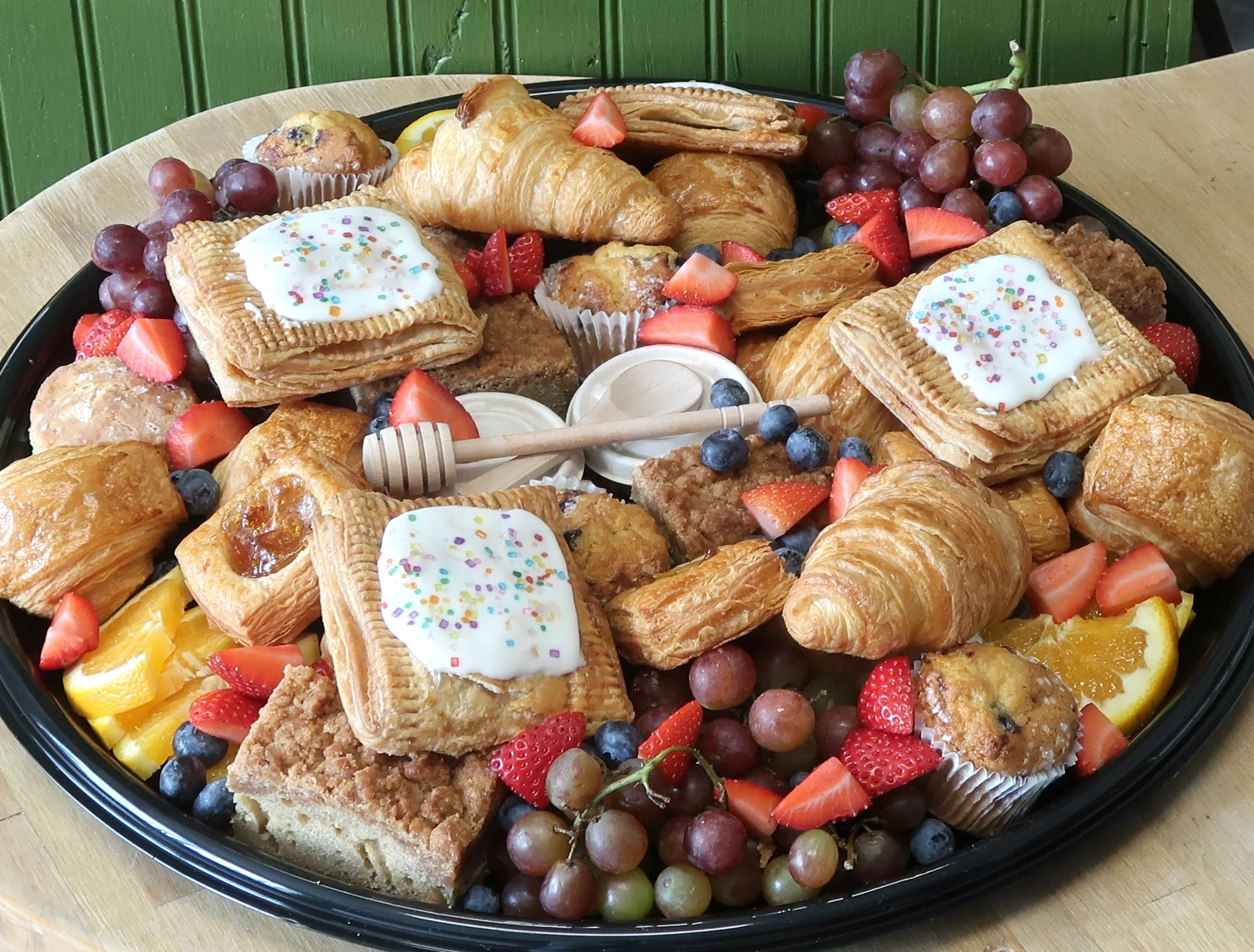 Assorted pastry platter with fruits and sweets for brunch