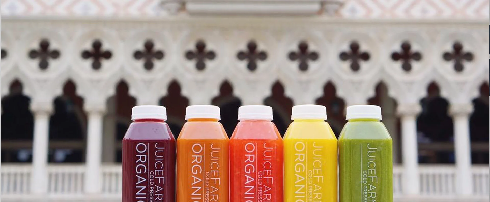 Colorful assortment of organic cold-pressed juices