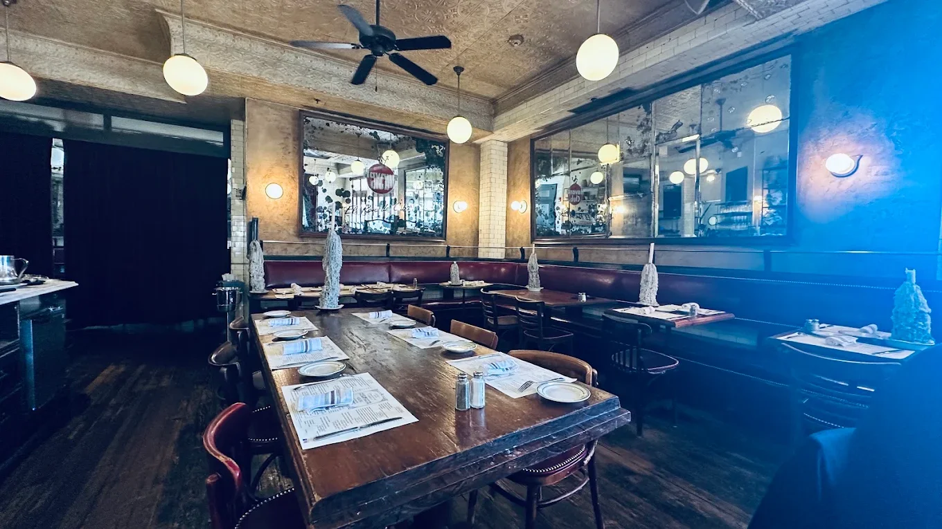 Cozy restaurant interior with wooden tables and warm lighting