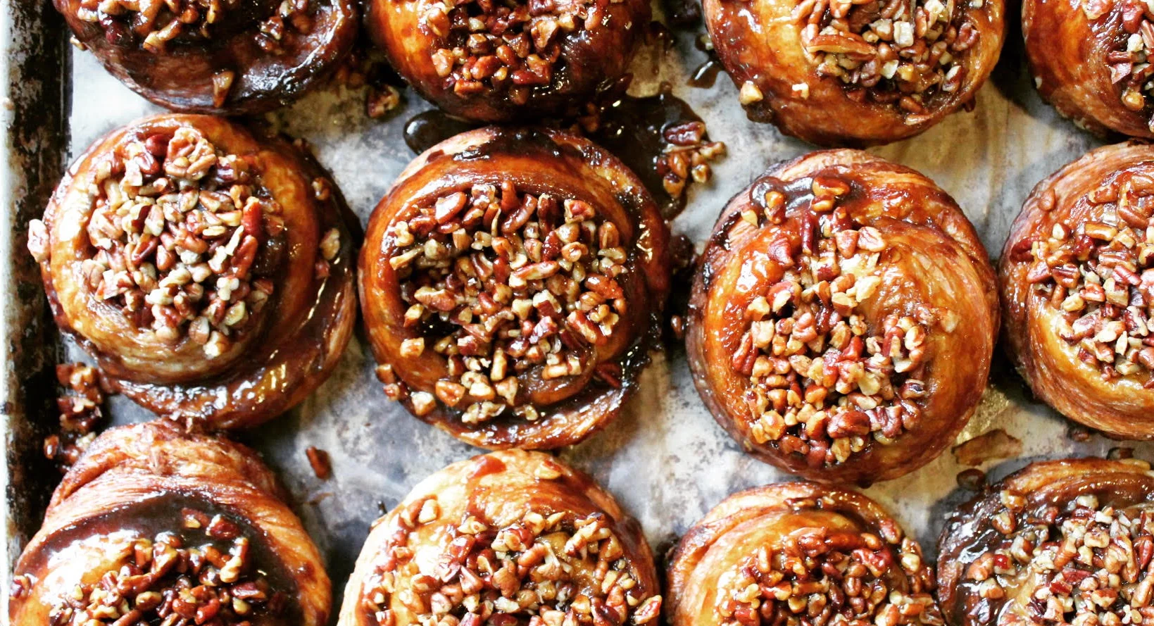 Pecan sticky buns on a baking tray