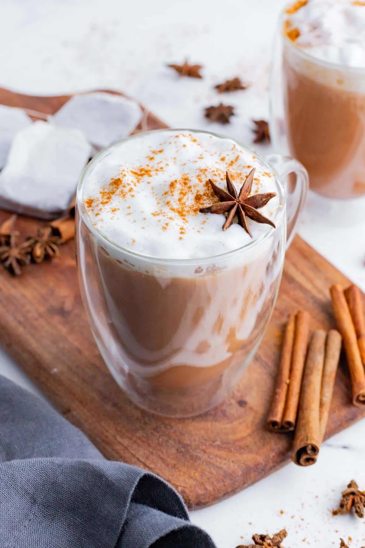 Creamy chai latte topped with spices and star anise