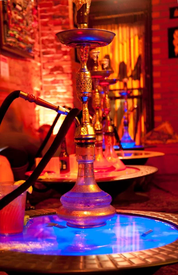 Colorful hookahs in a vibrant lounge setting