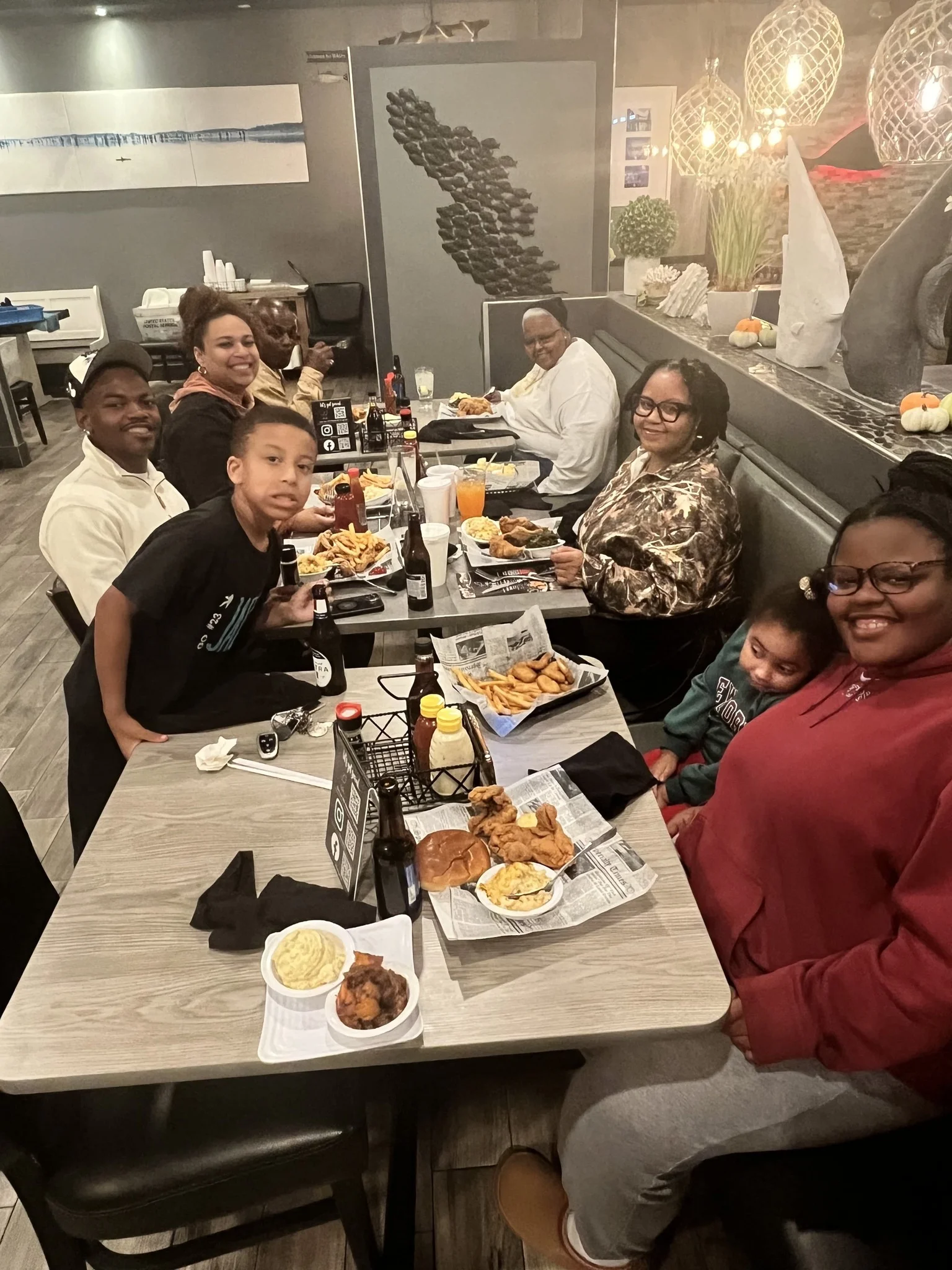 Family enjoying Southern comfort food at a cozy restaurant
