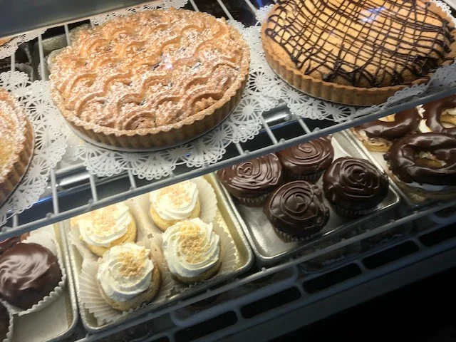Tarts and pastries in the bakery case at The Kosher Pastry Oven