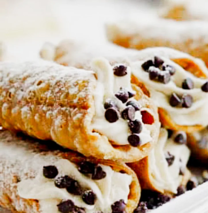 Italian cannoli filled with sweet ricotta and chocolate chips