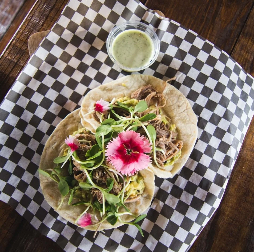 Authentic Mexican tacos with pulled pork and fresh toppings