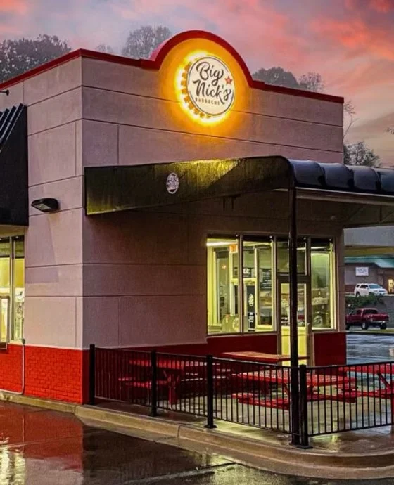 Exterior view of Big Nick's restaurant at sunset