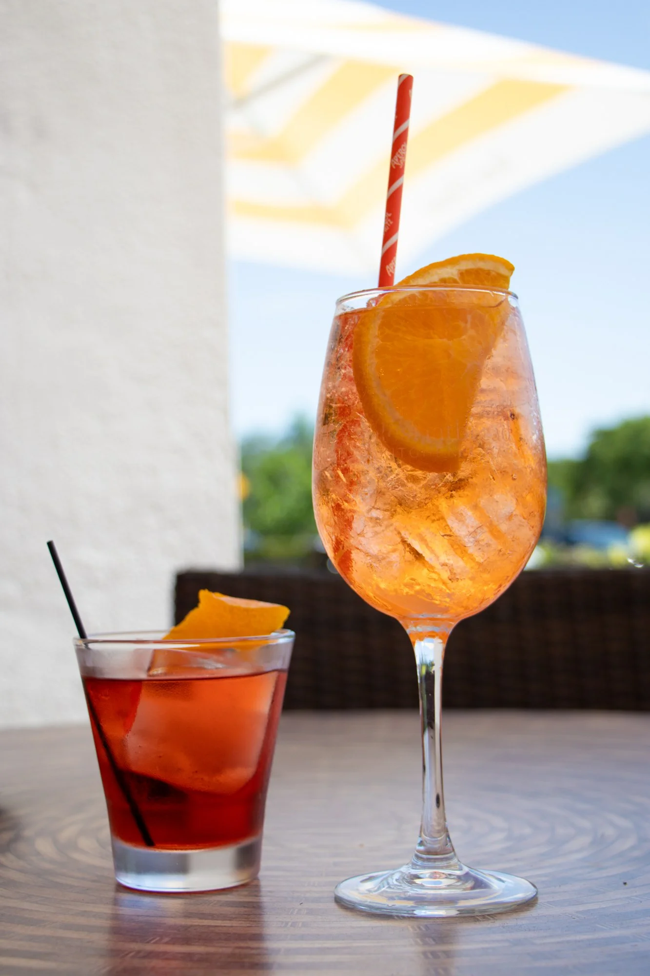 Aperol spritz and negroni on the patio at Naples Flatbread Kitchen & Bar, Estero FL