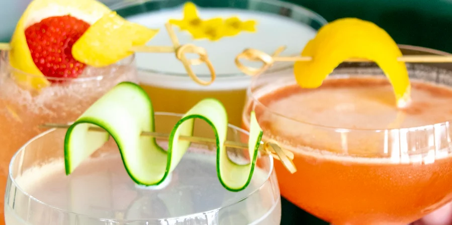 Colorful cocktails served in elegant glasses at a stylish bar