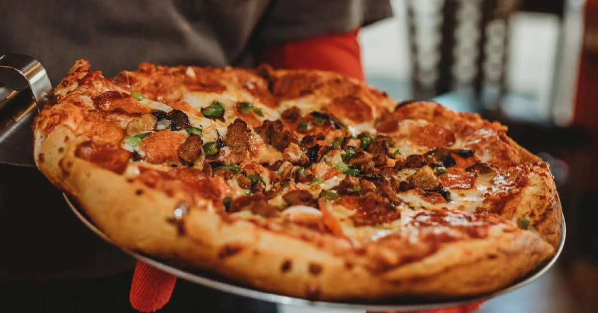 Delicious pepperoni pizza served fresh from the oven