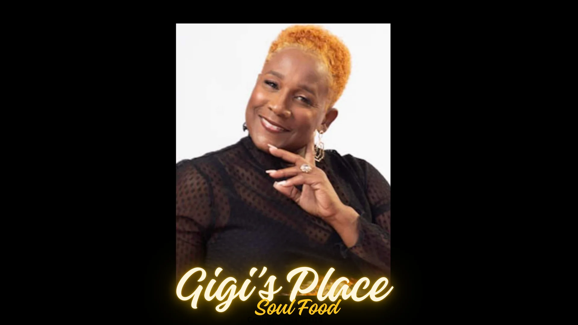 Owner of Gigi's Place Soul Food smiling warmly
