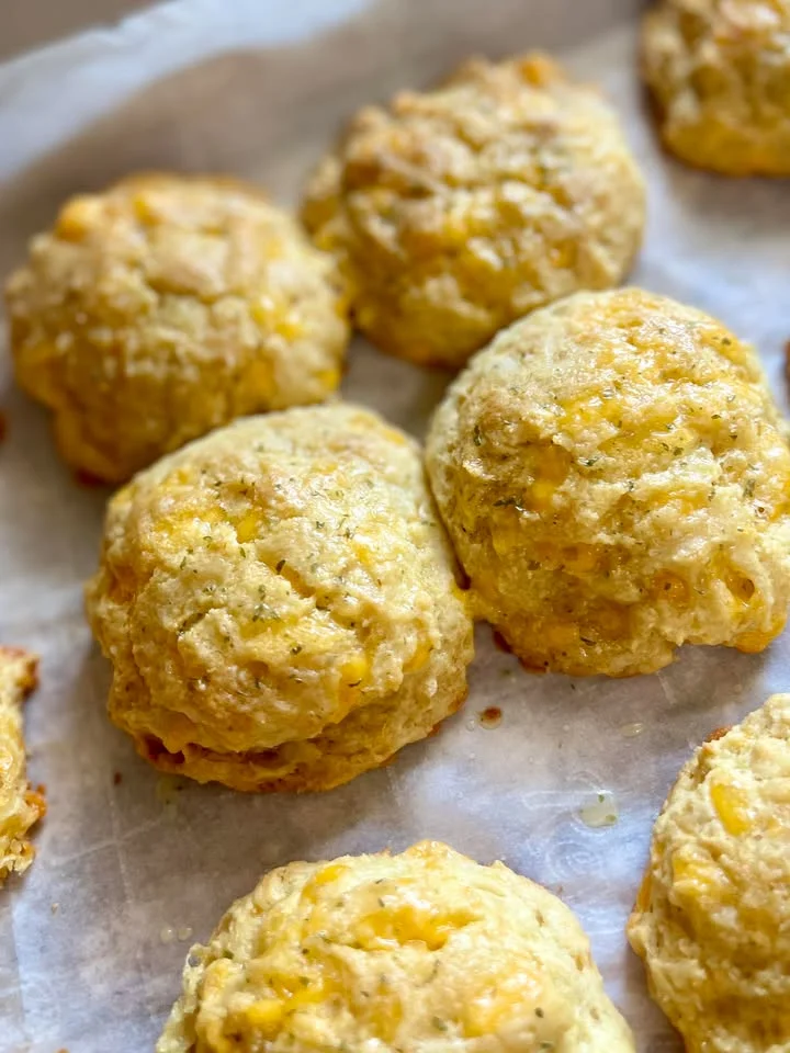 Cheddar biscuits fresh from the oven, golden and flaky