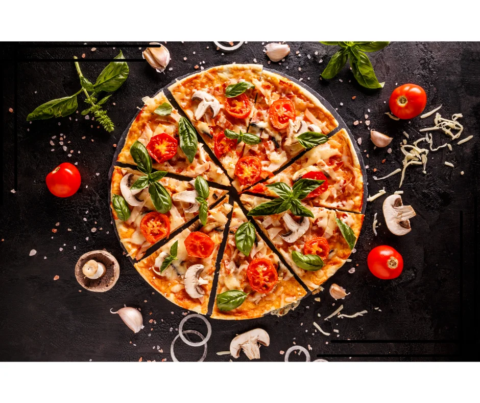 Delicious Margherita pizza topped with fresh basil and tomatoes