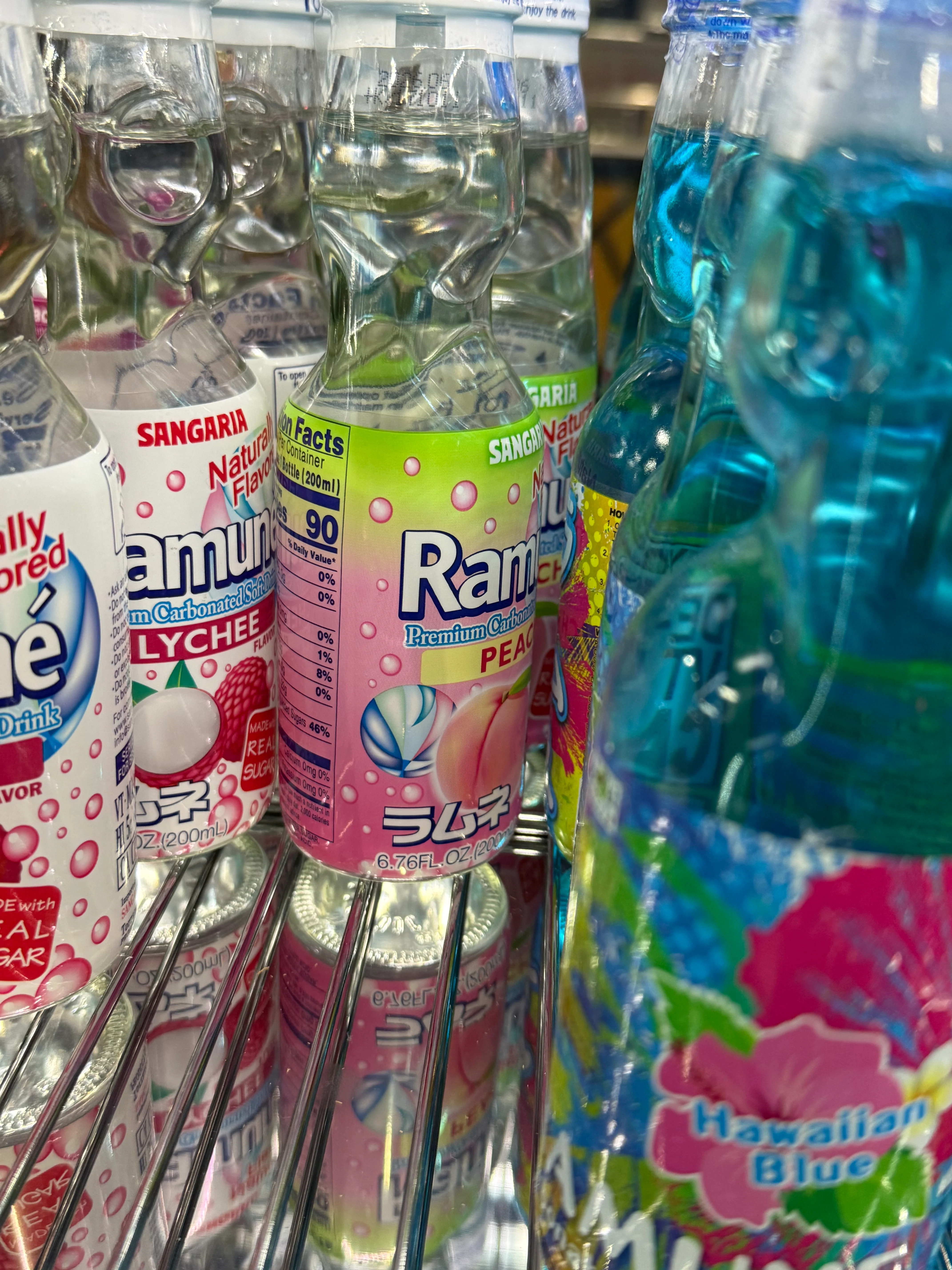 Colorful Japanese Ramune soda bottles on display