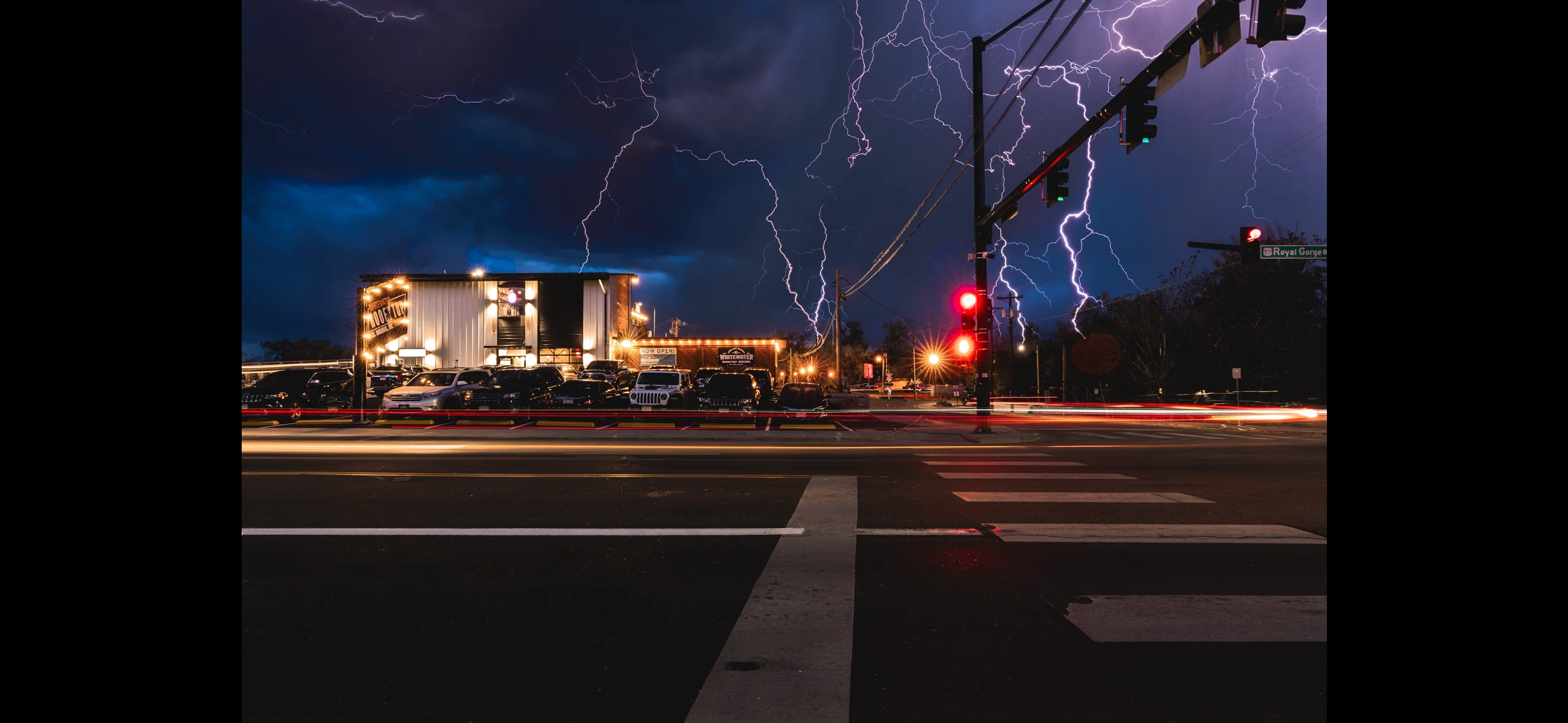 Dramatic stormy night with lightning over a restaurant