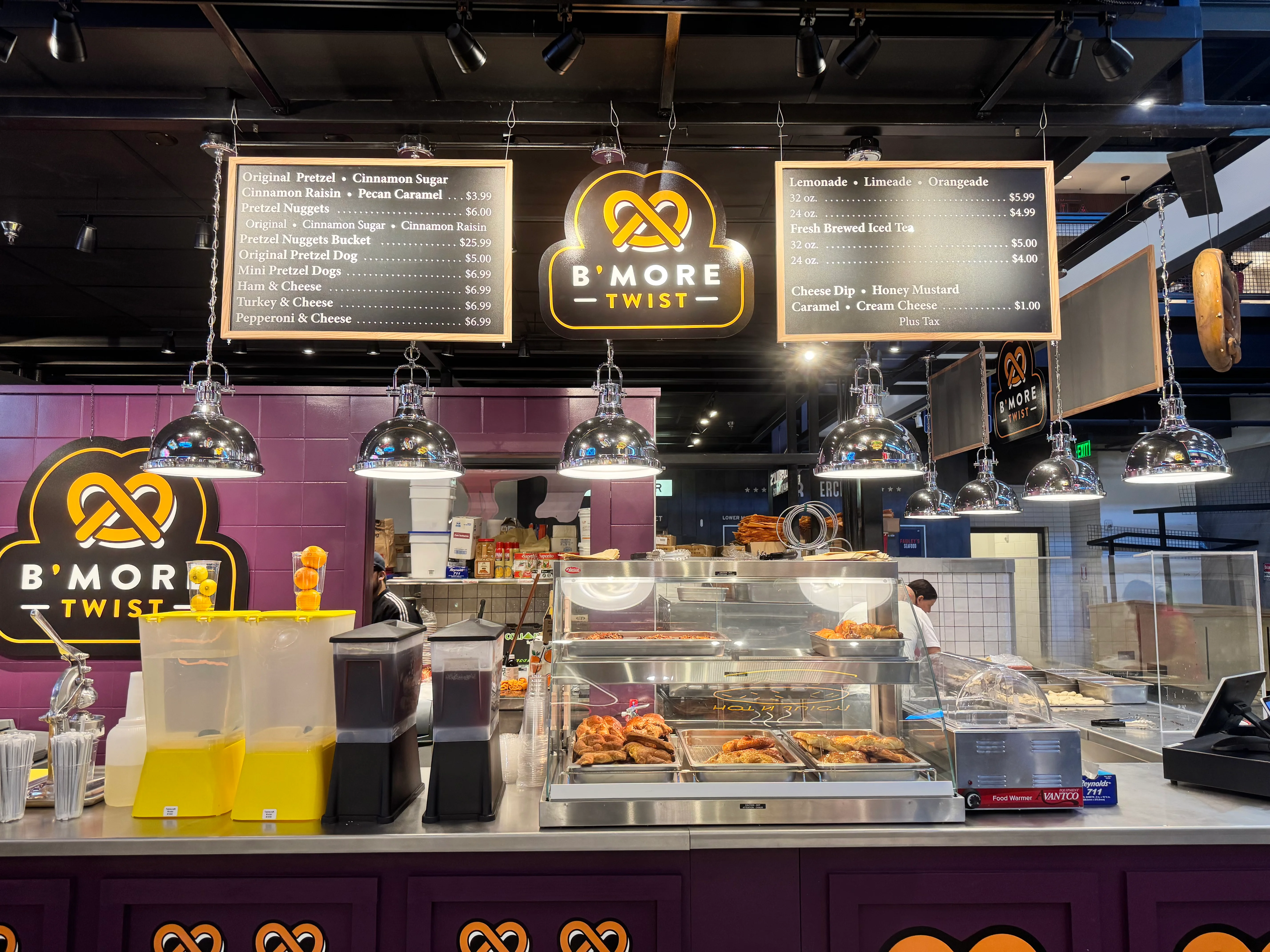 Pretzel stand featuring various pretzel options and drinks