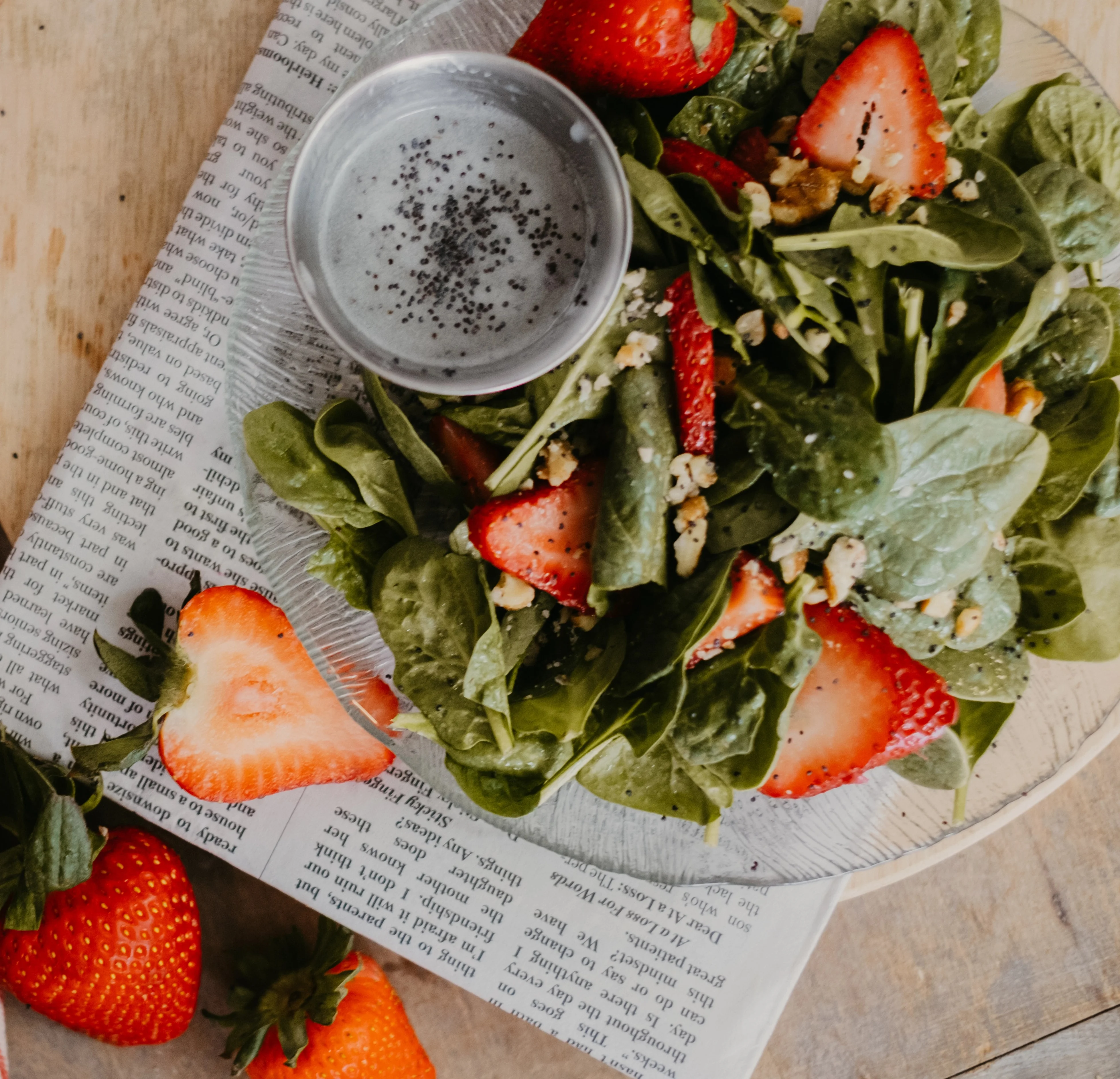 Fresh spinach salad with strawberries and poppy seed dressing